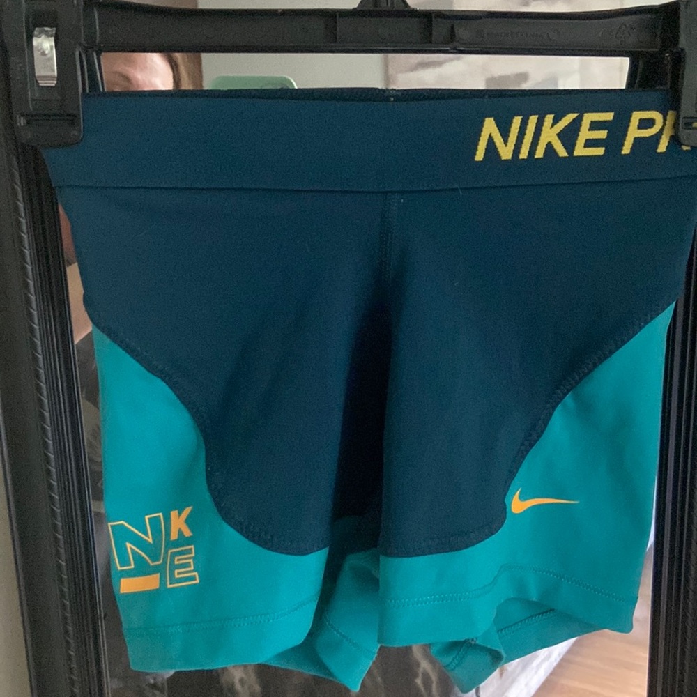 Navy and aqua blue Nike Pros!